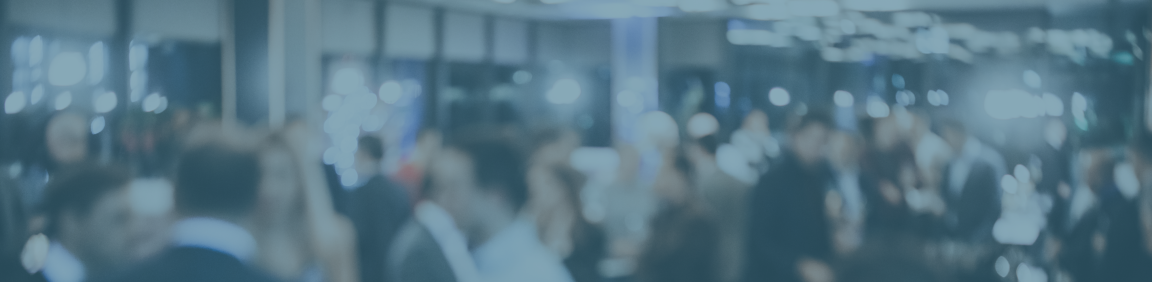 Abstract background of a busy office event with a blue overlay.