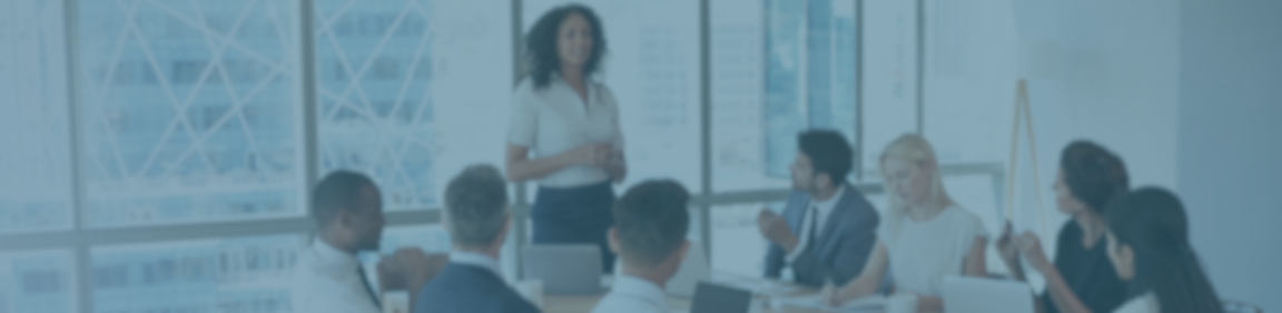 Abstract background of an in office meeting with a blue overlay.